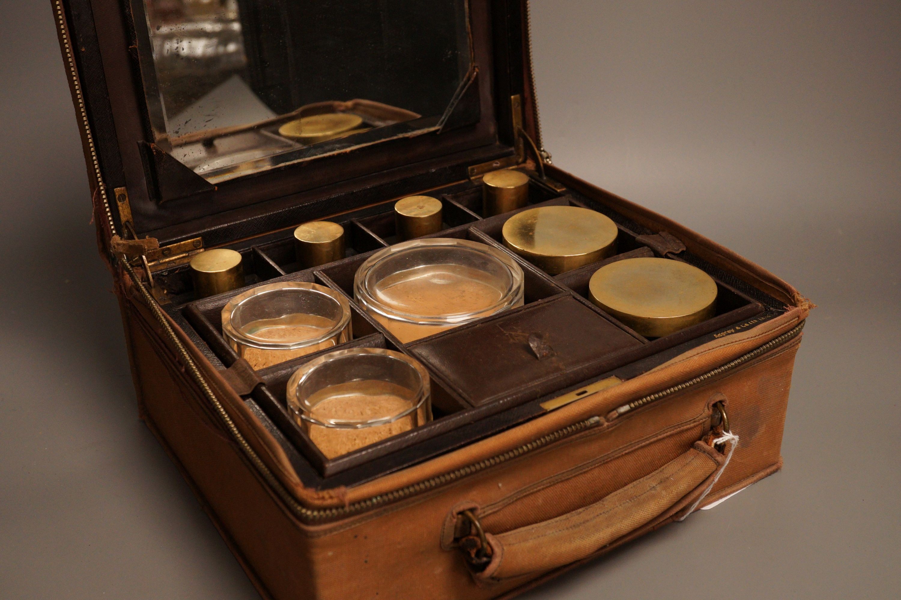 An Asprey & Co. leather clad travelling vanity case